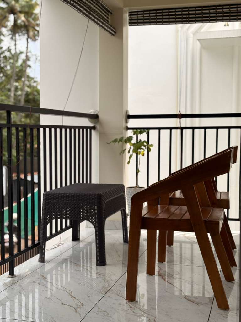 Private balcony seating overlooking the garden